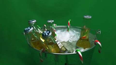 1-2 rotating green screen metalic bucket of beer iced with candy canes Stock-Footage 145147876