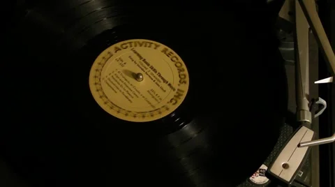 1-33 LP record on 1960s turntable v2 Stock Footage 5701338
