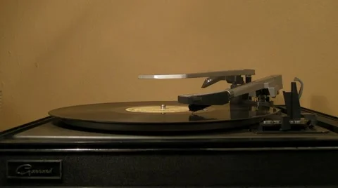 1-33 LP record on 1960s turntable - song ends Stock Footage 7727468