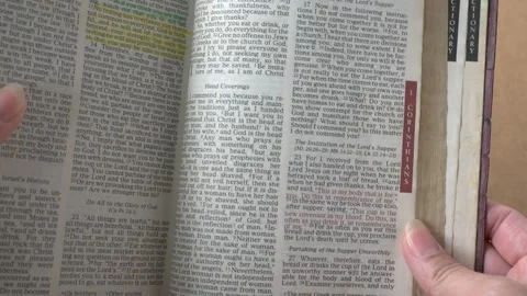 1 Corinthians Chapter 11 on the Lord’s Supper of the Holy Bible. Stock Footage 306628539