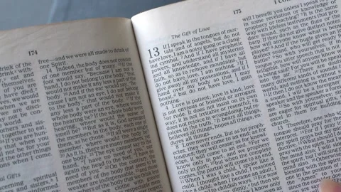 1 Corinthians chapter 13, passage on love. New Testament, Holy Bible. Video stock 334019848