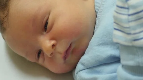 1 day old newborn boy gestures and motion closeup Stock Footage 71731676