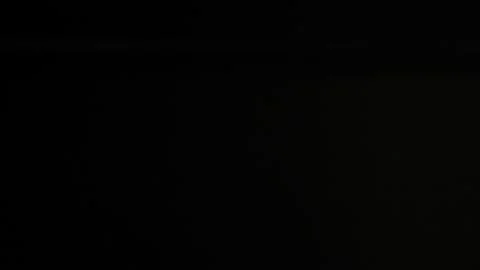 1 Euro coin falls on a black mirror Stock Footage 130631653