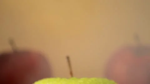 1 Green Apple, 2 Red Apples - Crane Down Stock Footage 22339902