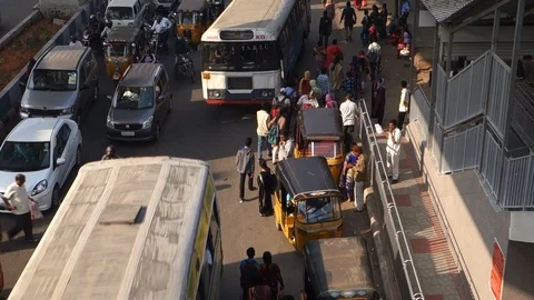 1-High-Angle-View-busy-bus-stop-people-traffic Stock Footage 89420641