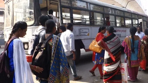 1-indians-waiting-for-bus-at-bus-stop Stock Footage 89389694