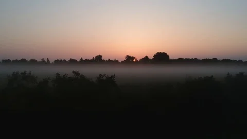 1 meditative flight to the sun through and through summer fog Stock Footage 124840514