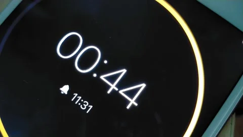 1 minute digital timer time lapse. electronic digital timer on iphone display. Stock-Footage 245423557