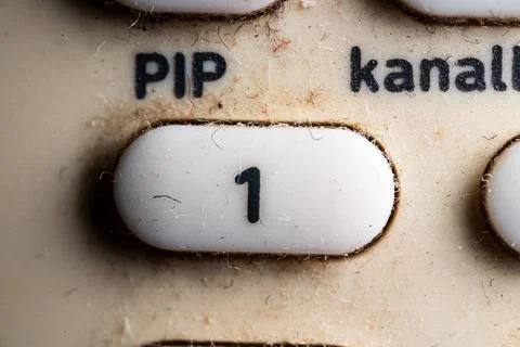 1 Number icon and button close up of a old Television remote controller Stock Photos