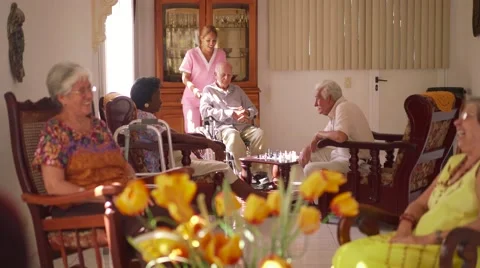 1-Nurse Pushing Old Man On Wheelchair In Hospice Stock Footage 61789248