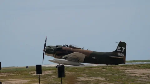 A-1 Skyraider and C-7 Caribou Taxi Back at Tinker Air Force Base Airshow Stock Footage 110742984