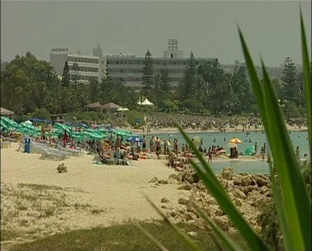 1 Tourists on the beach in southern Cyprus 16:9 -JPEG 75 PAL Stock Footage