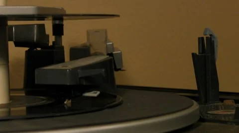 1-Two 45 single record spinning around on 1960s turntable v3 Stock Footage 7730125