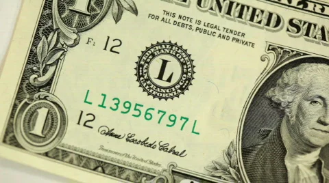 $1 U.S. bill - overhead pan Stock Footage 306218