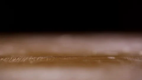 1 Use a rolling pin to thin out the butter slices close-up Stock Footage 236549628