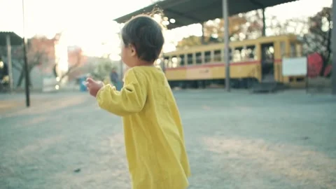 1 year old kid playing outside on holiday Video stock 161858533