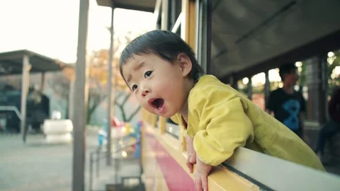 1 year old kid playing outside on holiday Video stock 161858605