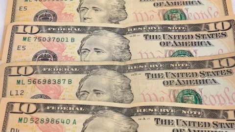 10 and 100 dollar bills on the table. The concept of money and business. Stock Footage 132800522