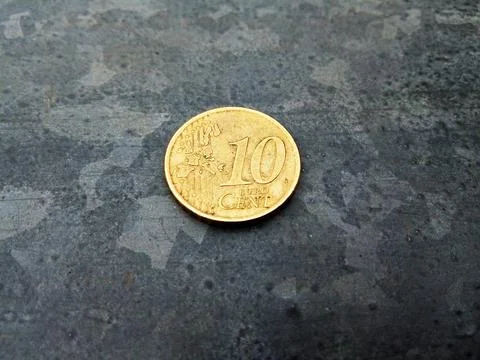 10 cent coin on a table Stock-Fotos