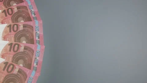 10 euro bills rotating on the table. Rotation of money. Top view, Copy space. Vidéo 142193367