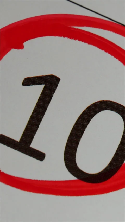 10 - Marking the date in the calendar with a red marker. The  tenth day of the m Stock Footage 283991722