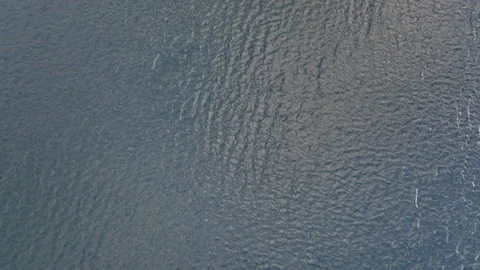 10 Seconds drone flying fast over alpine lake Stock Footage 219913713