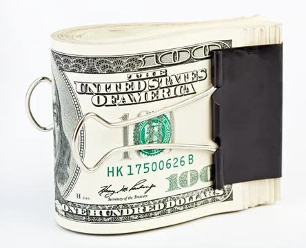 10 thousand us dollars bundle fasten with paper clip Stock Photos