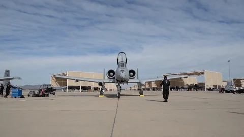 A-10 Thunderbolt demo team marshaller signalling to pilot pre-flight flap checks Stock Footage 104600862