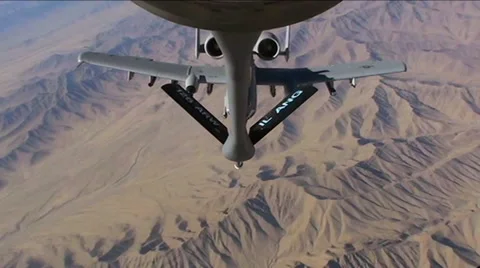 An A-10 Thunderbolt gets refueled by a KC 135 Stratotanker. Stock Footage 67412973