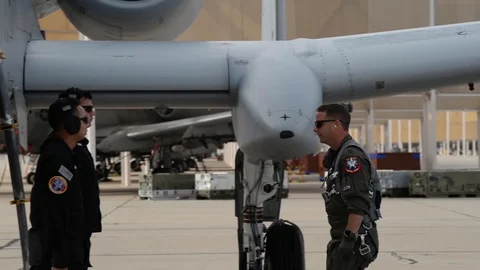 A-10 Thunderbolt II pilot greets demo team aircraft marshallers Stock Footage 104600766