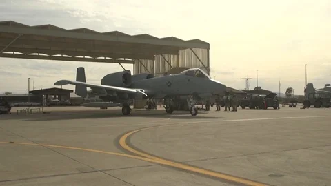 A-10 Thunderbolt Warthogs leaving hangar 2 Stock Footage 111849077