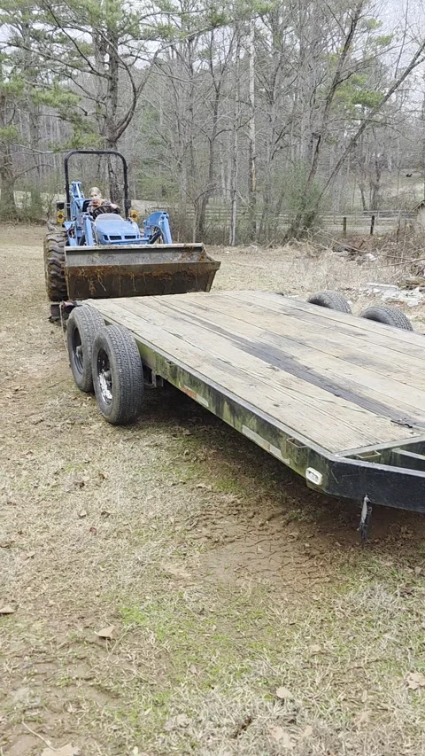 10-Year-Old Daughter Loading Tractor for Dad, Waleska, Georgia, USA - 26 Dec 202 Stock Footage 325404001