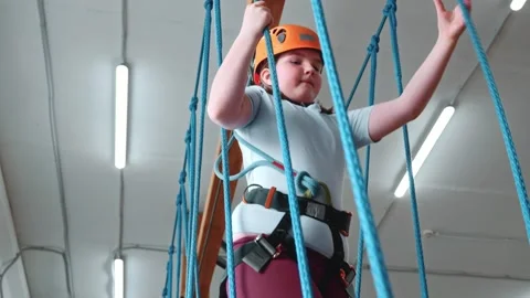 A 10-year-old overweight little girl is moving towards her goal Stock Footage 274234790