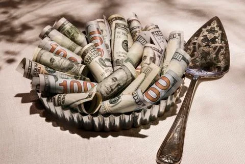 $100 bill pie with server Stock Photos