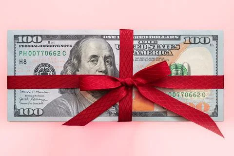 100 dollar banknotes with bow Stock Photos