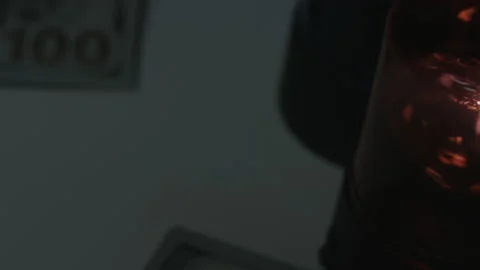 100 Dollar Bills Fall Onto Rotating Police Lights 4K Video stock 217854654