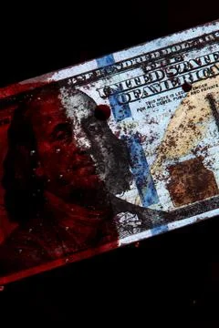 100 dollars banknote drowned in a pool of blood Stock Photos