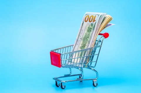 100 dollars note in a tiny basket Stock Photos