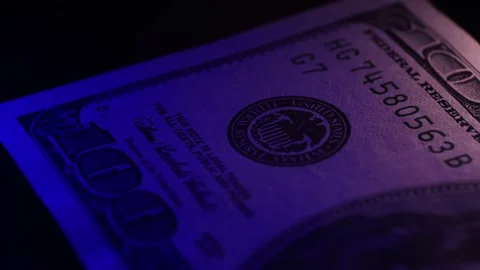100 dollars sliding, blue and white lighting Stock Footage 230501675