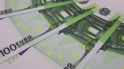 100 euro bills rotating on the table. Rotation of paper money, close-up, FullHD Vídeo Stock 141315325