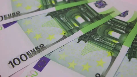 100 euro bills rotating on the table. Rotation of paper money, close-up, FullHD Vídeo Stock 141429871