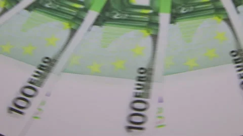 100 euro bills rotating on the table. Rotation of paper money, close-up, FullHD Vídeo Stock 141723100