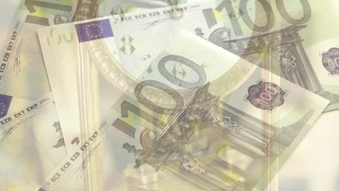 100 euro notes fading from upper-left sliding and settling over clock showing Stock Footage 328584224