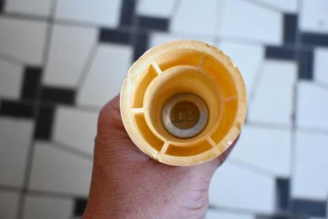 100 forint coin in an empty ice cream cone Stock Photos
