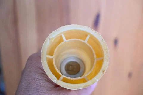 100 forint coin in empty ice cream cone Stockfoto's