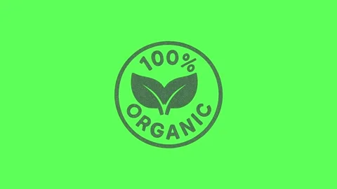 100% Organic rubber stamp vector illustration. Natural bio product oval seal  Stock Footage 327963813