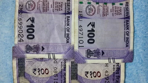 100 Rupee Indian Currency Note - Slider Shot - Backwards Stock Footage 276722016