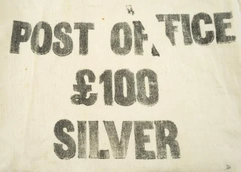 £100 silver printed on a Post Office bank deposit cash / cloth money bag Stock Photos