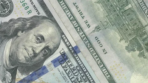 100 US dollar bills USD 4k intro video for business Stock Footage 106875396