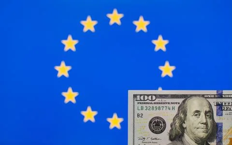 100 US dollars banknote on background of European Union flag Stock Photos